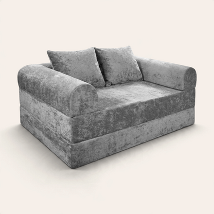 Sofá cama modular Naap Concept Teddy en color gris con textura suave, diseño sin esquinas duras y dos cojines