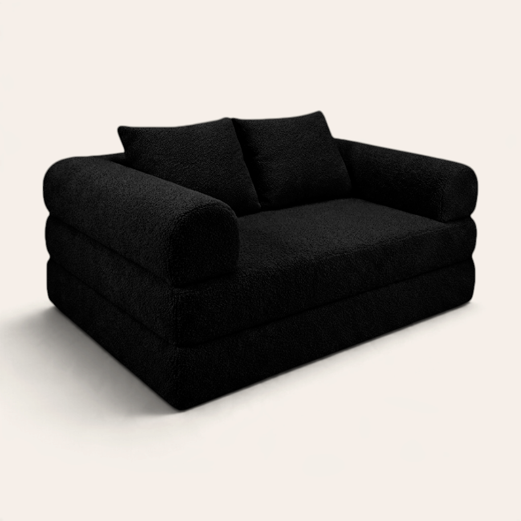 Sofá cama modular Naap Concept Teddy en color negro con textura de borreguito y diseño ergonómico sin esquinas duras