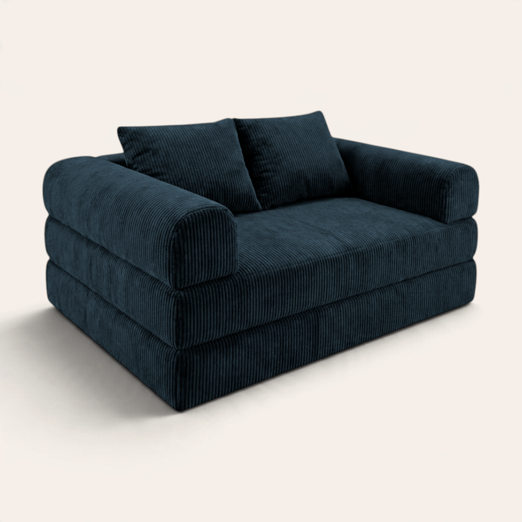 Sofá cama modular Naap Concept Teddy en color azul oscuro con textura de pana y diseño ergonómico sin esquinas duras.