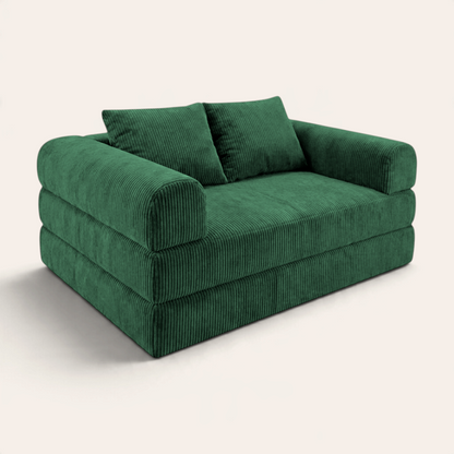 Sofá cama modular Naap Concept Teddy en color verde con textura de pana, diseño versátil y brazos desmontables.