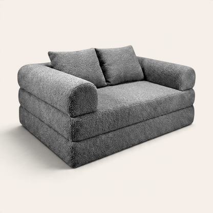 Sofá cama modular Naap Concept Teddy en color gris con textura de borreguito y cojines desmontables