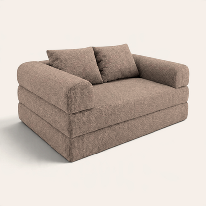 Sofá cama modular Naap Concept color café con textura suave y diseño versátil sin esquinas rígidas